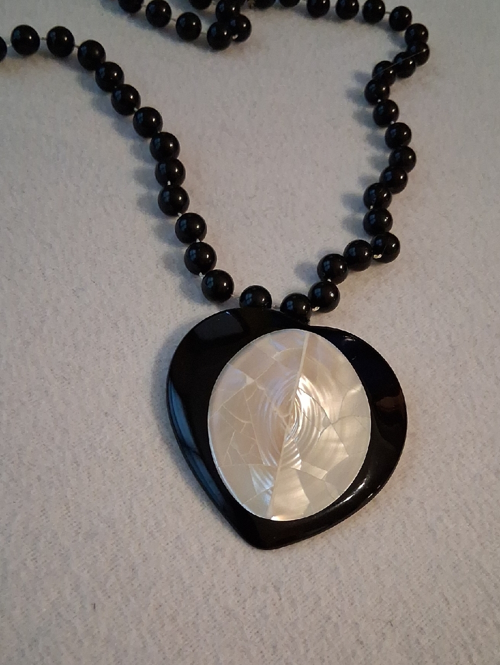 Black Heart Pendant Necklace with Cream Mother-of-Pearl Center